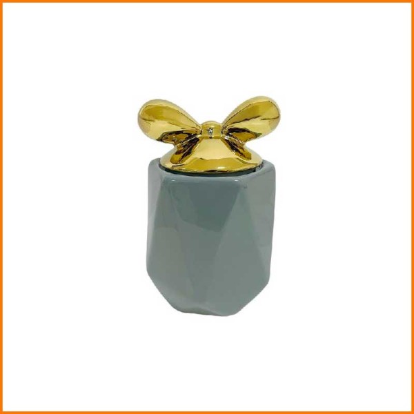 BARATTOLO GRIGIO PORCELLANA CON TAPPO FIOCCO ORO D.11X14H CM